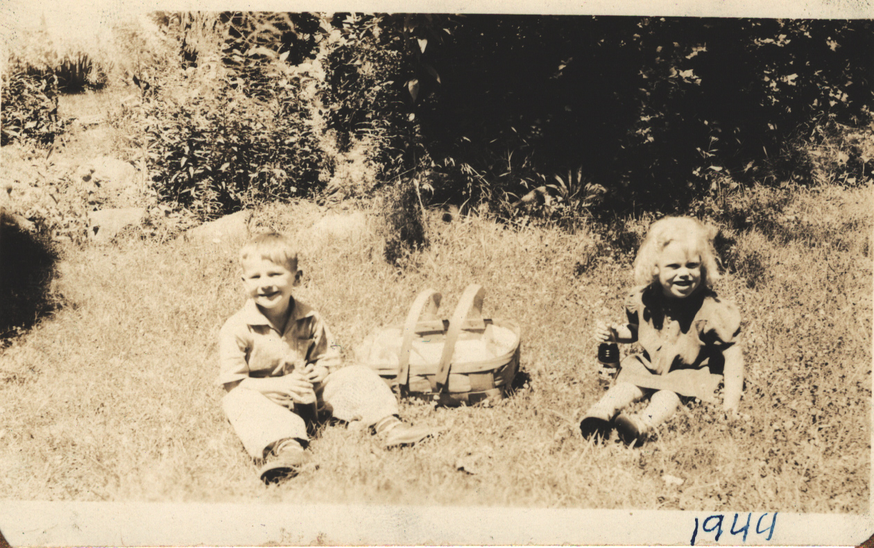 Two children and a picnic basket 1944