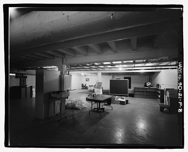 8. Interior view of large space; showing door to storage...