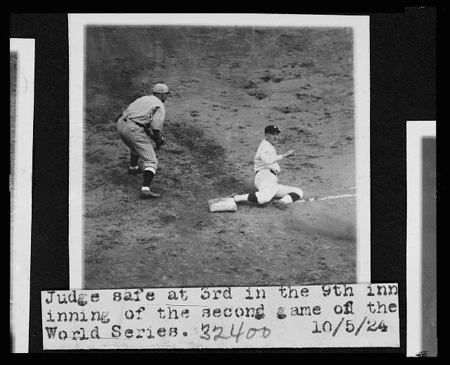 [Joe Judge, of the Washington Nationals, sliding safely...