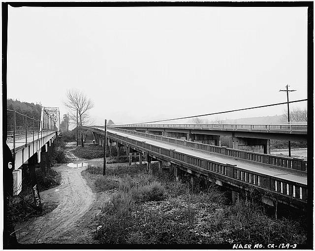 3. CONTEXTUAL VIEW OF BRIDGE IN SETTING, LOOKING...