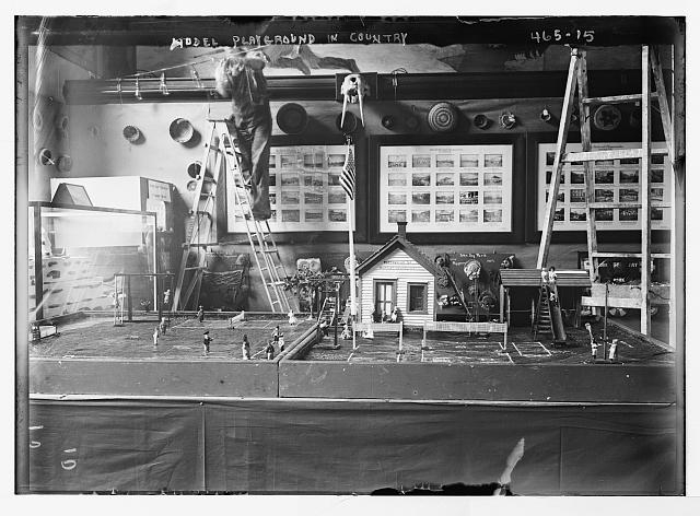 Model playground and schoolhouse in country, New York State