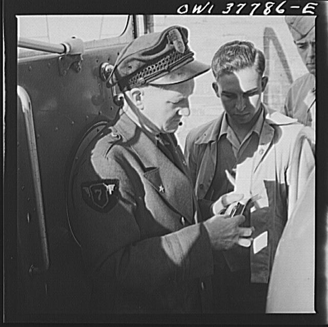 Chicago, Illinois. A bus driver collecting tickets at the...