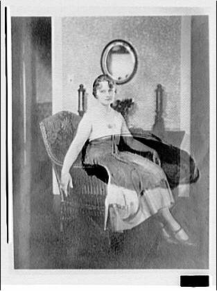 Portrait photographs. Seated woman