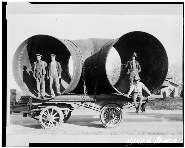 9. VIEW SHOWING WORKERS POSING WITH PART OF HORSE MESA...
