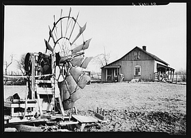 Dwelling and portable windmill of a farmer on land to be...