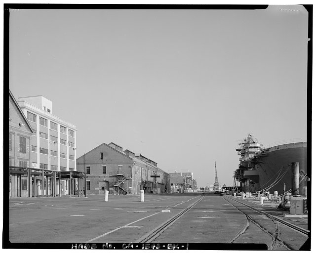 Contextual view of building 69 looking north along the...