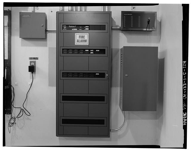 124. FIRE ALARM SYSTEM PANEL AT WEST SIDE OF SOUTH WALL,...