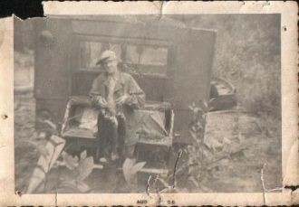 Man with string of fish