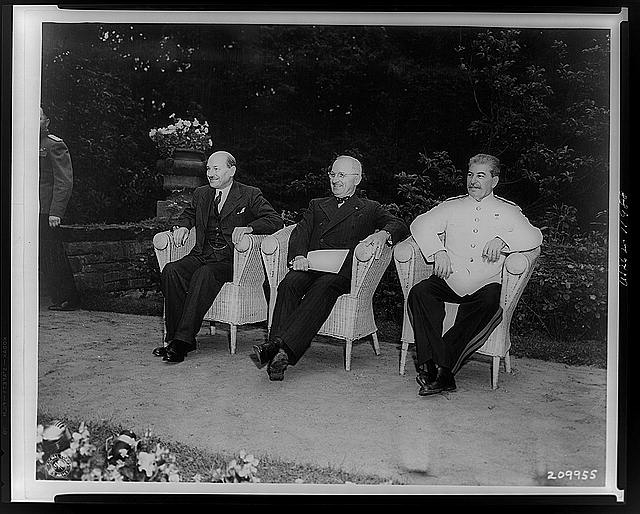 [Clement Attlee, Harry Truman, and Joseph Stalin, seated...