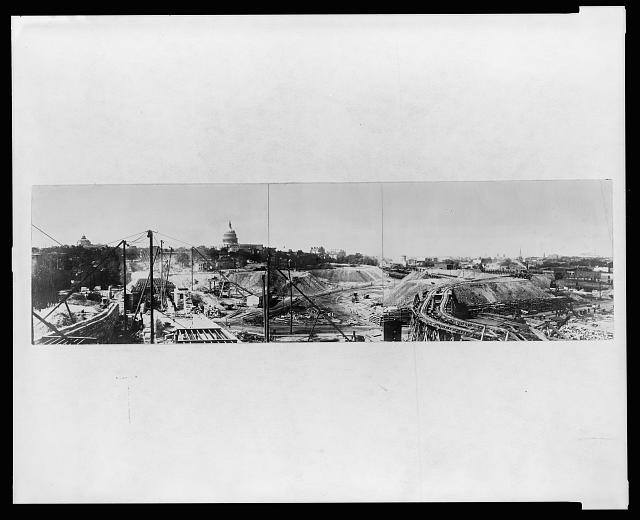 [Panoramic view of the construction site and equipment...