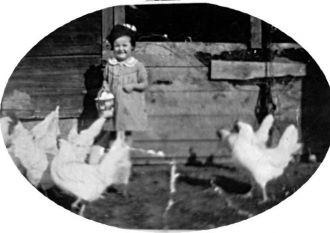 Little girl with chickens