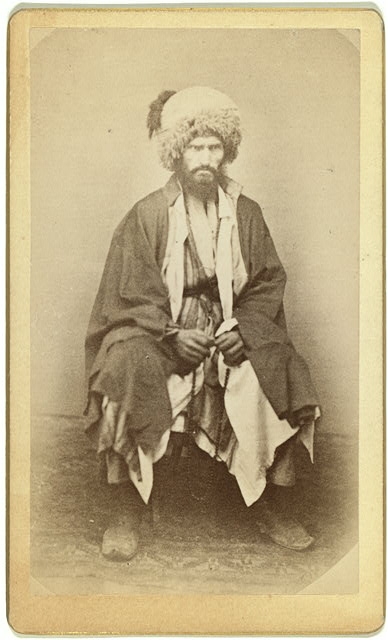 [Full-length portrait of man, seated, facing front]