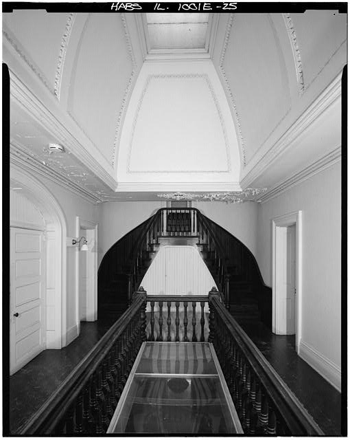 25. Third-floor main hall and stairs to tower; looking E....