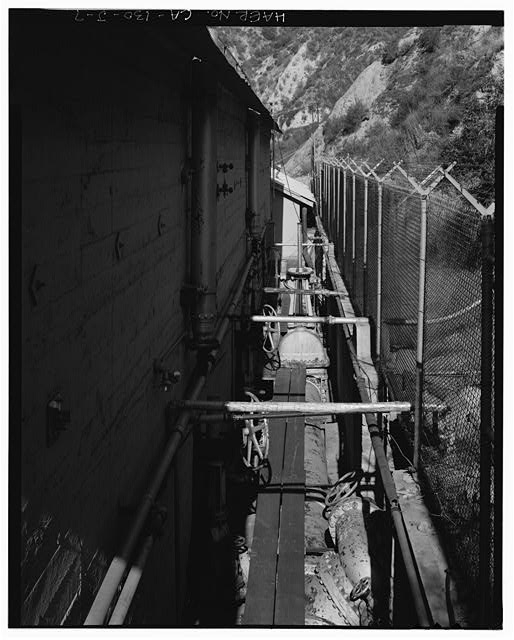 7. SOUTHEAST PENSTOCK ENTERING RECEIVER ON NORTHEAST SIDE...