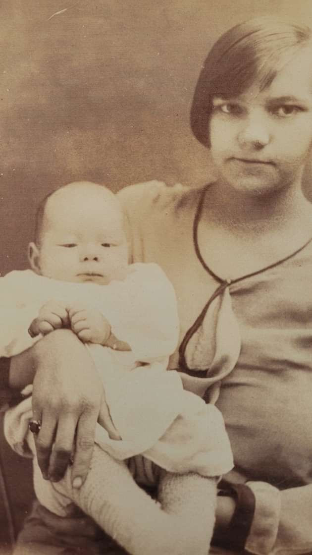 Adah Louise Clement
My grandmother. Dads mother holding son Raymond Russell 