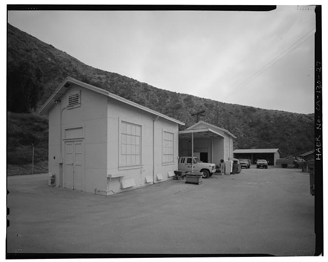27. NORTH AND WEST ELEVATIONS OF WAREHOUSE (LEFT) AND...
