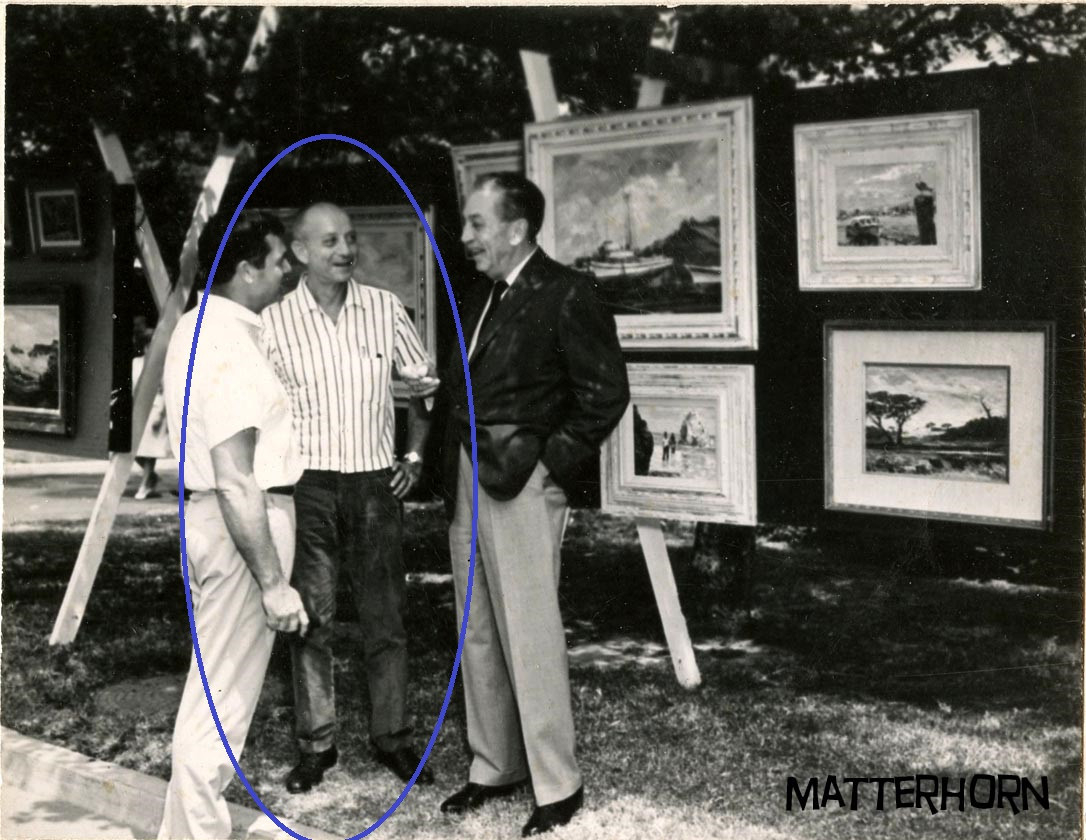 John Datu Arensma chats with Walt Disney and colleague at Disney's art show.