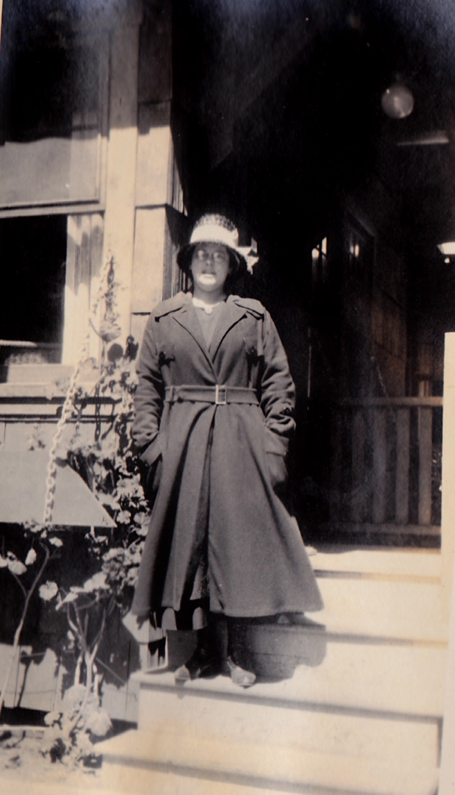 Woman in large coat