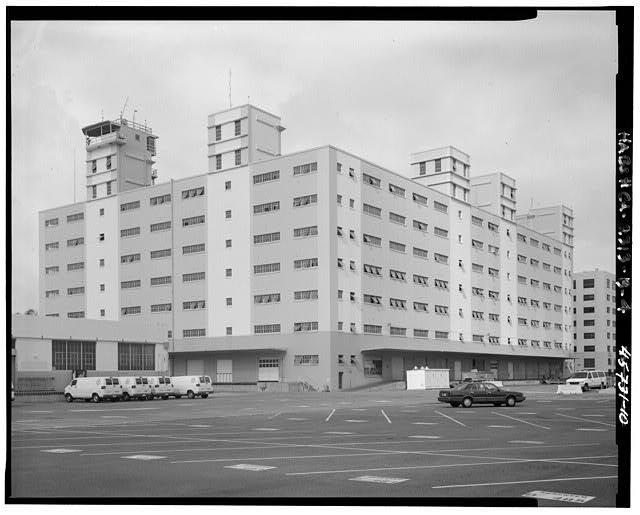 Building, south side and east back. Camera facing...