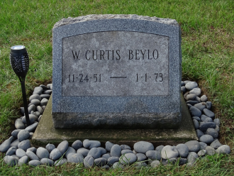 Bills head stone after cleaning and addition of stones and solar light. September 8 2022.