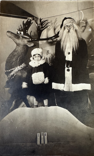 Young Girl at Christmas with Santa