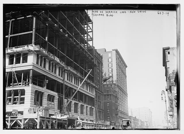 Derricks and workmen for construction of New Union Square...
