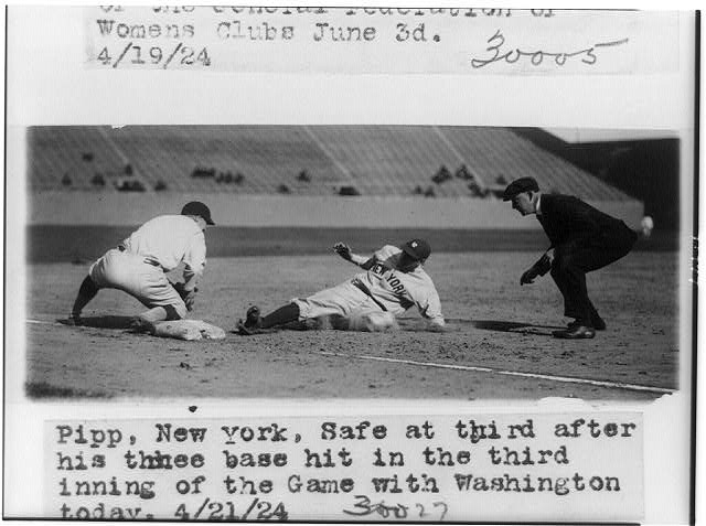 [Baseball player Pipp of New York sliding into third base...