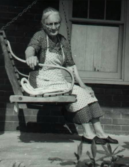Della Jane SMEDLEY Foster Sitting on Her Porch