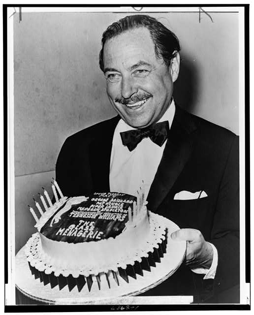 Tennessee Williams with "birthday" cake for the 20th...
