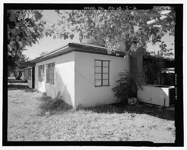 South front and part of the east side, oblique view to...