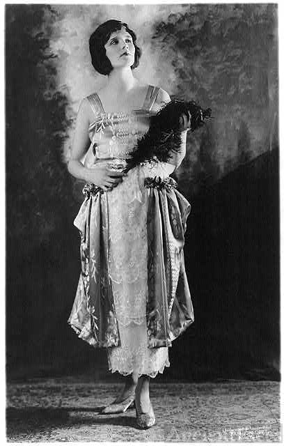 Woman modelling 1919 dress
