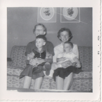 Charles Irvin Hutchens and his mother on L and George M. Mulling, III, and his mother on right