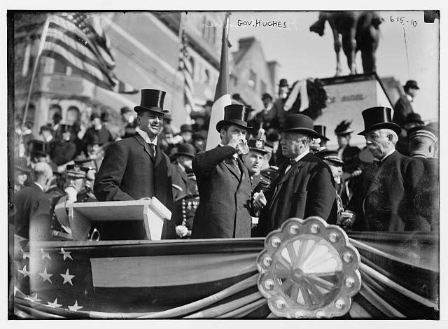 Gov. Hughes and others, on podium