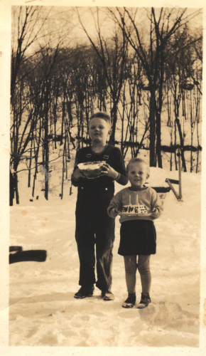 Two Children in the Snow with a Birthday Cake Two Children in the Snow with a Birthday Cake