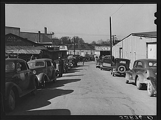 Street in warehouse district during tobacco auction...