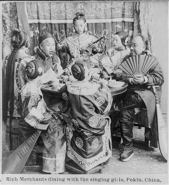 Rich merchants dining with the singing girls, Peking, China