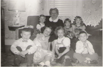 Margaret with her grand kids 