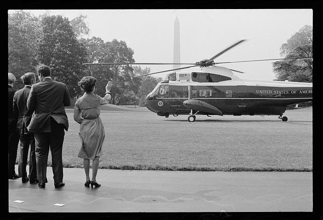 [Helicopter blades begin turning as First Lady Rosalynn...