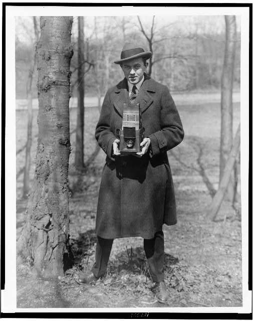 [John Steel, full-length portrait, holding camera in a...