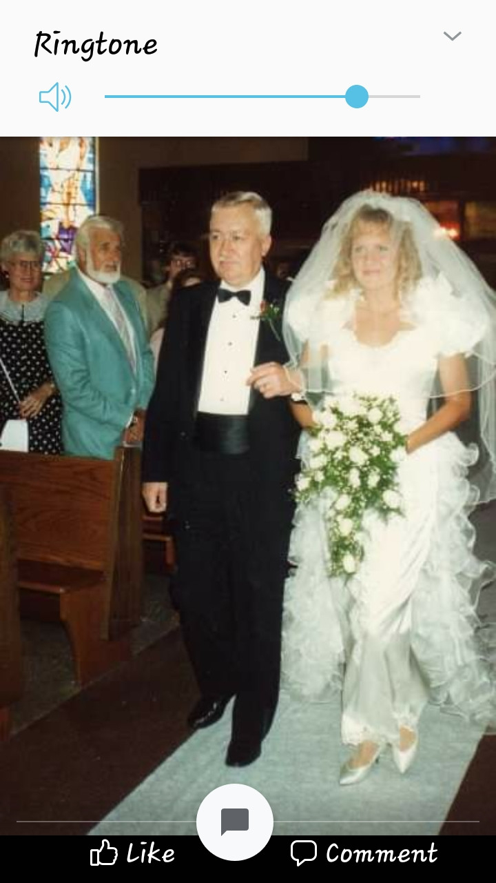 Raymond Giving his second daughter Karen away at her wedding.