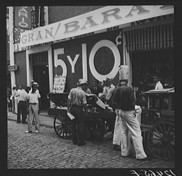 Pushcart vendors in front of a five and ten store. San...