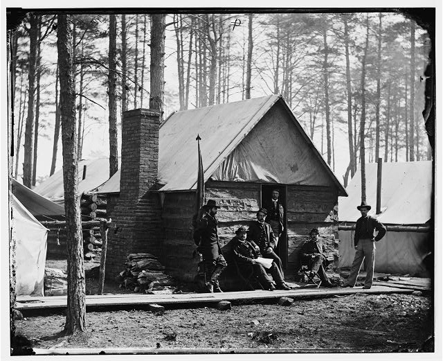 [Brandy Station, Va. Officers in front of winter quarters...