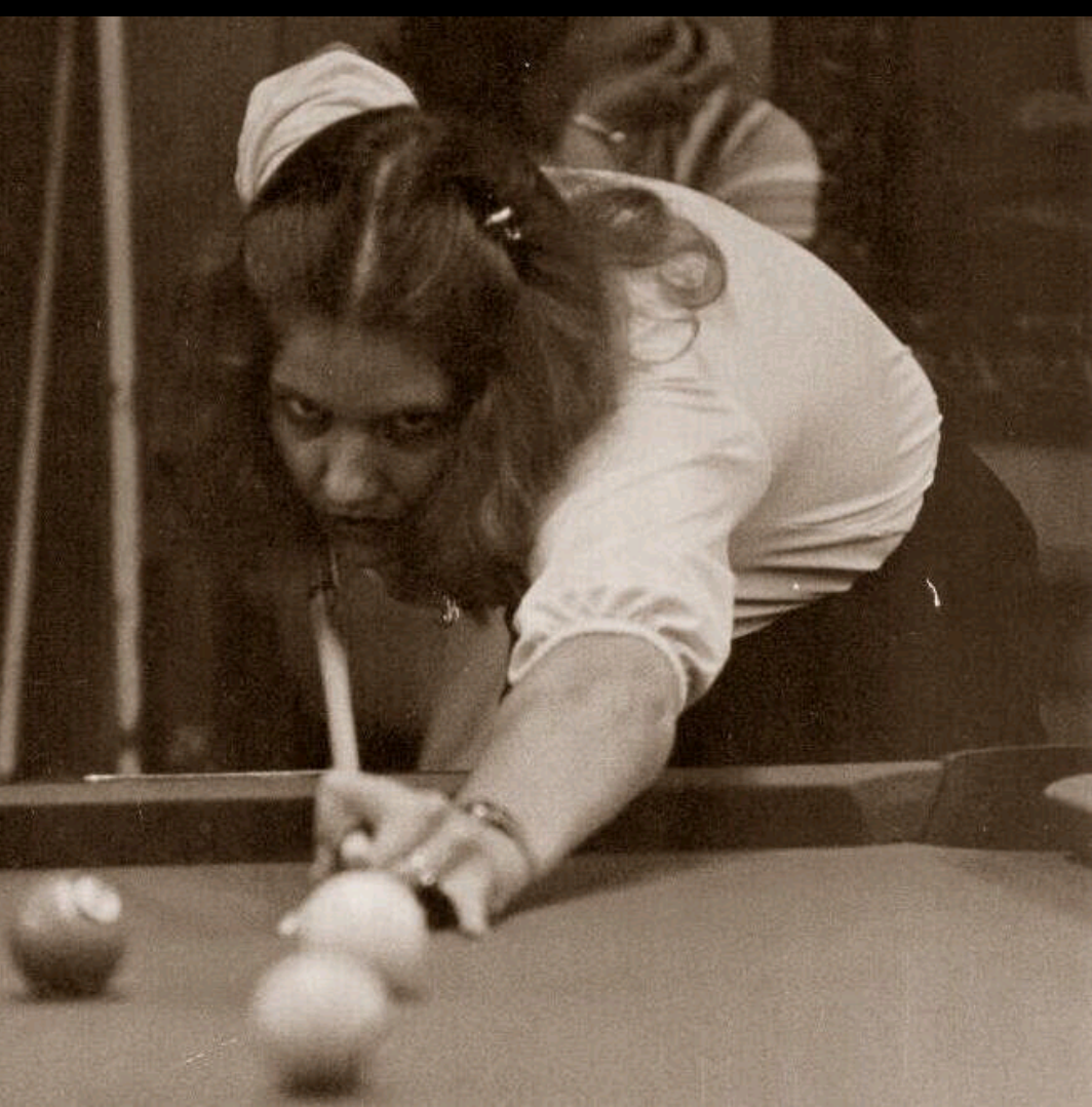 Lori playing pool