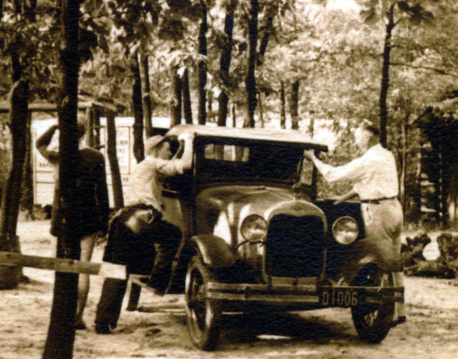 Clinton, Howard L. & Howard M. Alexander Working on "The Bruise" 1930 Ford Coupe