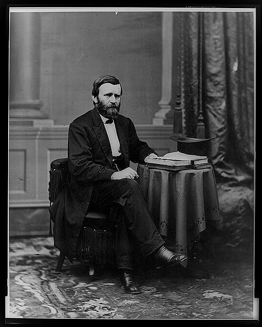 [Ulysses S. Grant, full-length portrait, seated at table...