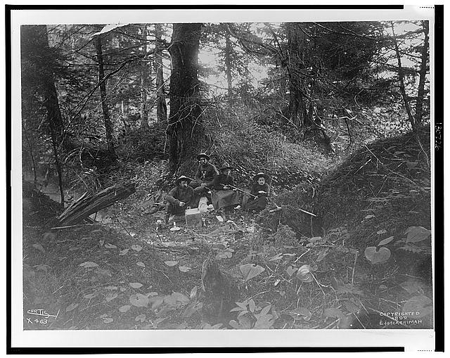 [Two men and two women seated in forest in Alaska, 1899]...