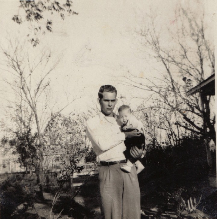 Willard Ralph Dean holding Roger