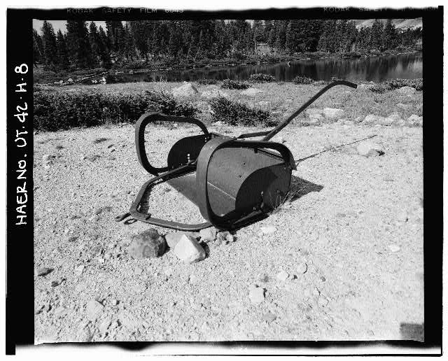 8. VIEW OF STEEL, STOCK-DRAWN EARTH SCRAPER USED TO SCAPE...