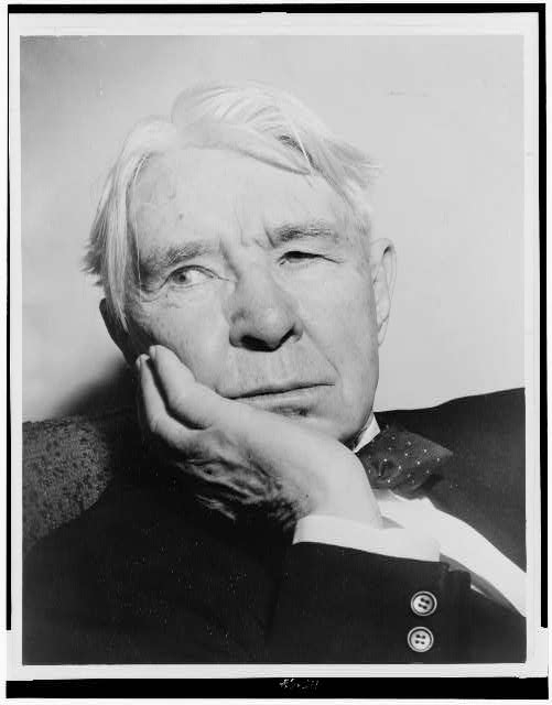 [Carl Sandburg, head-and-shoulders portrait, facing left]...