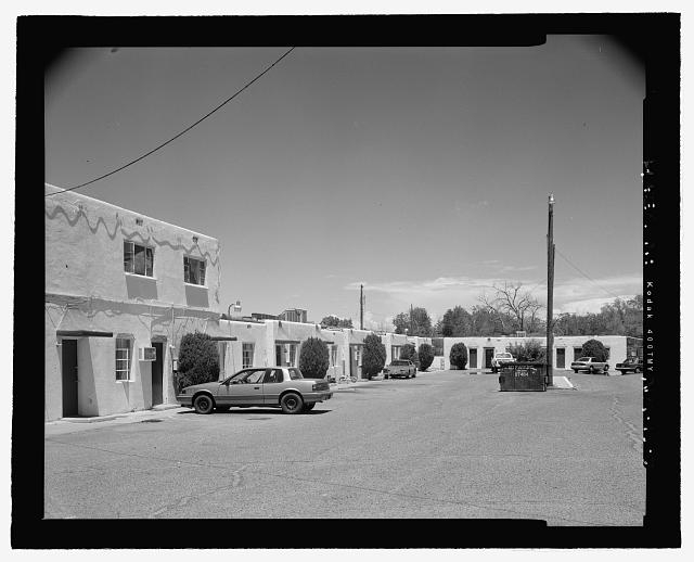General view of parking lot courtyard showing west and...